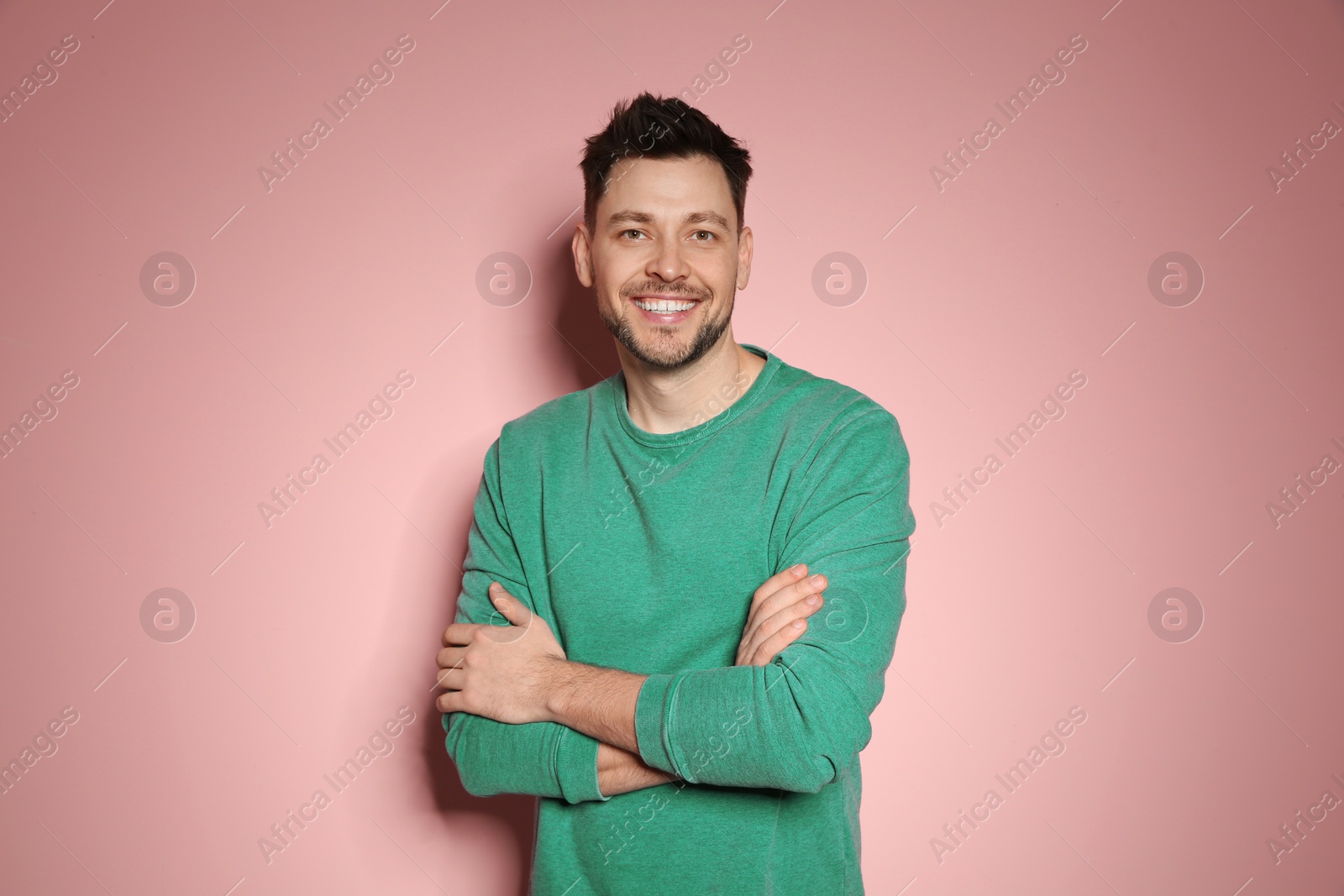 Photo of Portrait of handsome man in stylish clothes on color background