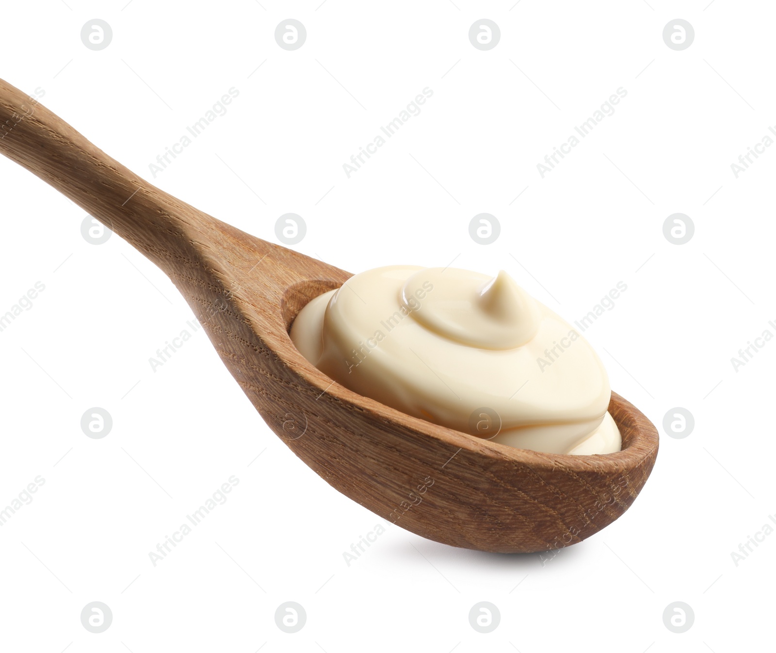 Photo of Natural yogurt in wooden spoon isolated on white