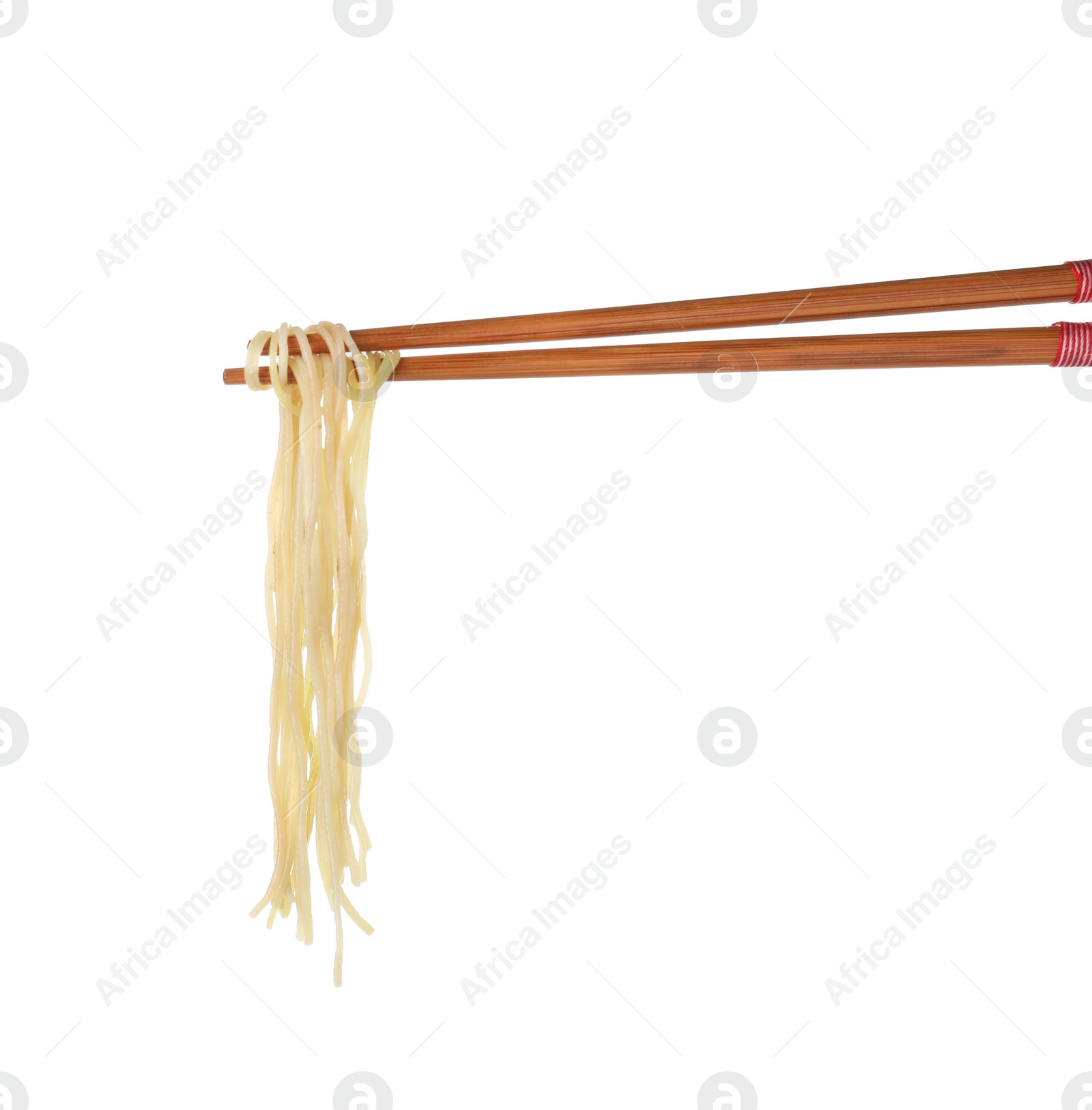 Photo of Chopsticks with tasty cooked Asian noodles isolated on white