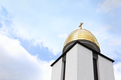 Photo of Beautiful church against blue sky, low angle view. Space for text