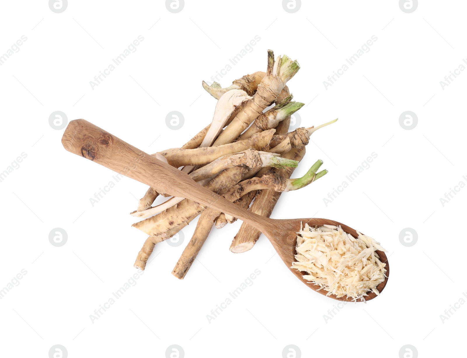 Photo of Spoon with grated horseradish and roots isolated on white, top view