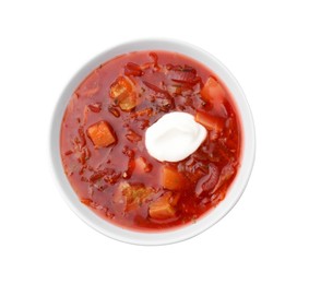 Photo of Tasty borscht with sour cream isolated on white, top view