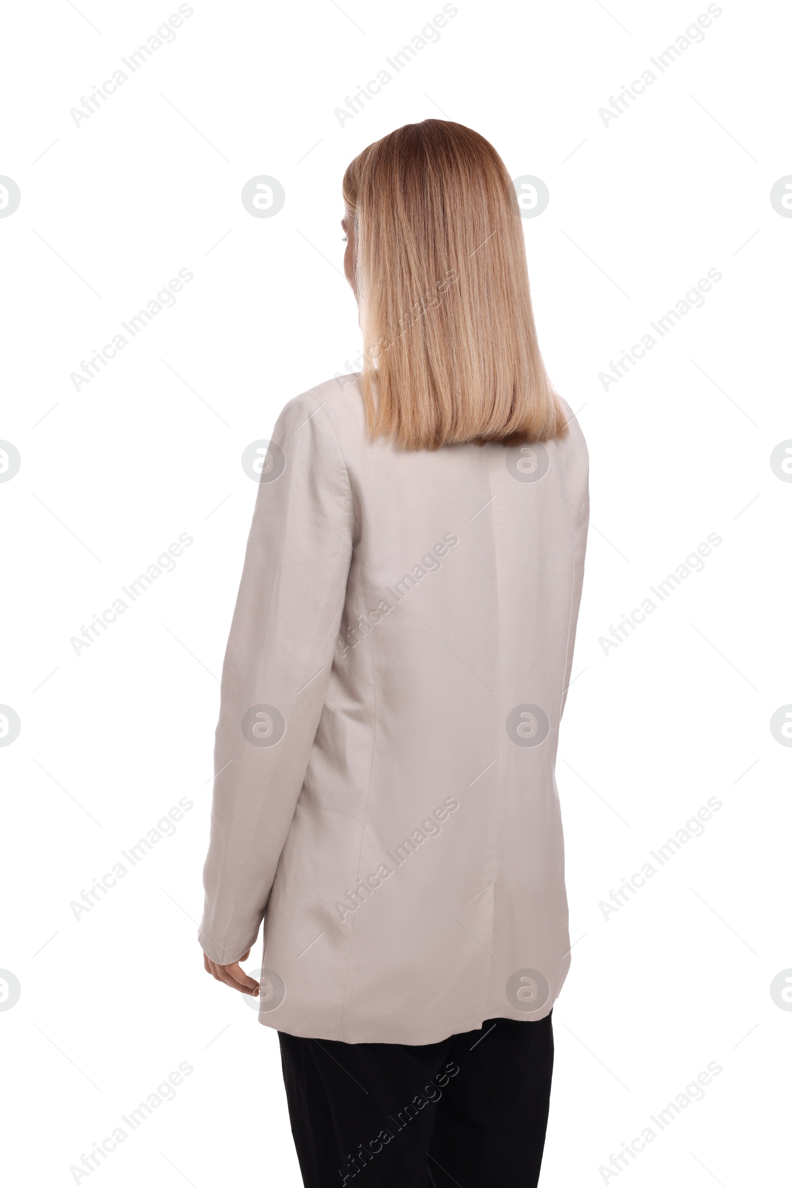 Photo of Businesswoman posing on white background, back view