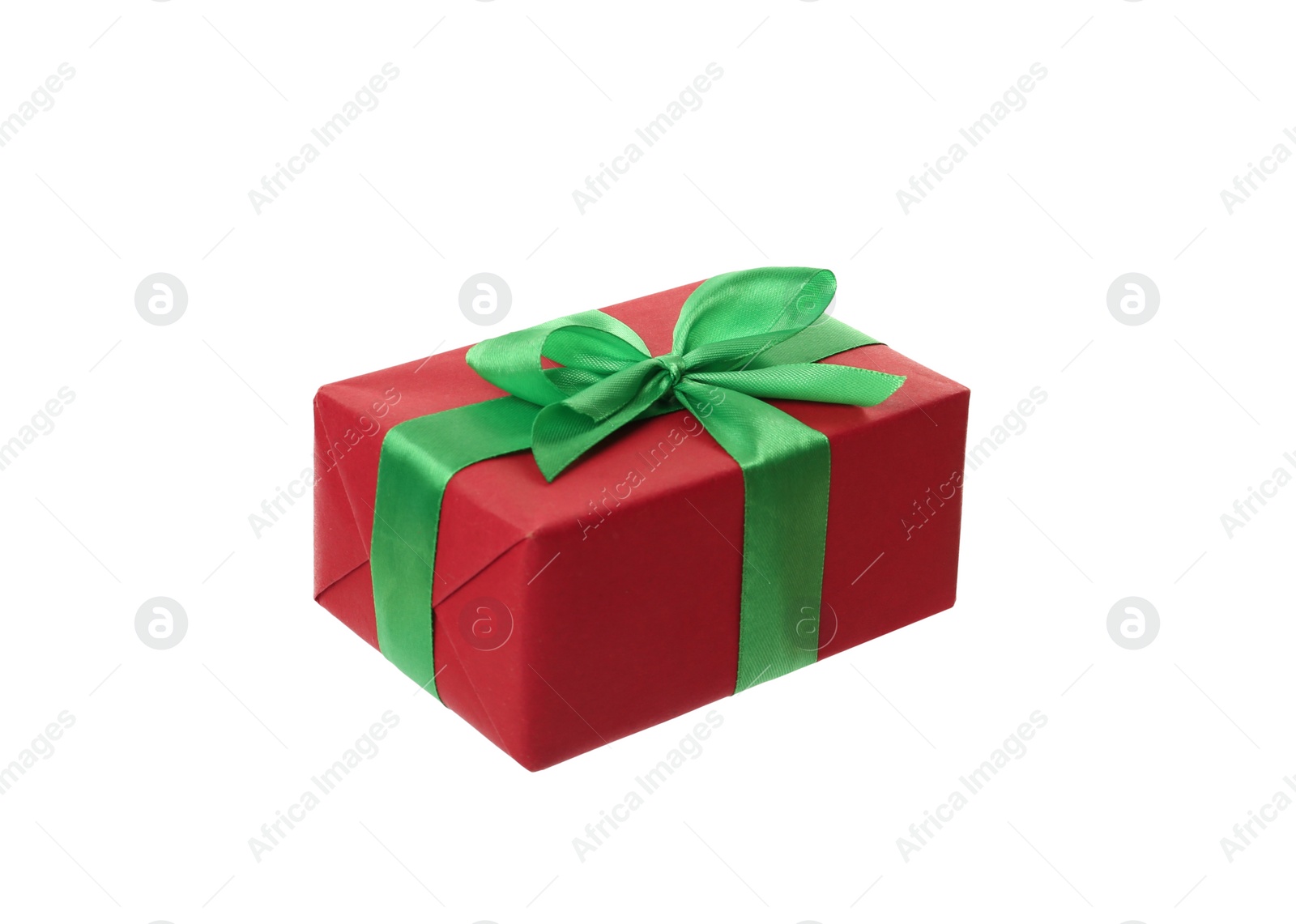 Photo of Red gift box with green bow isolated on white