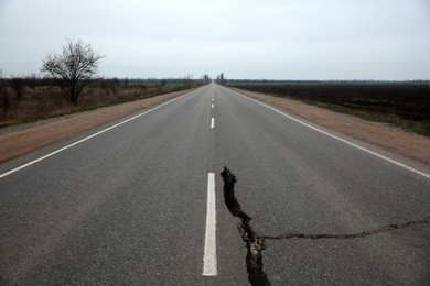 Image of Large crack on asphalt road after earthquake