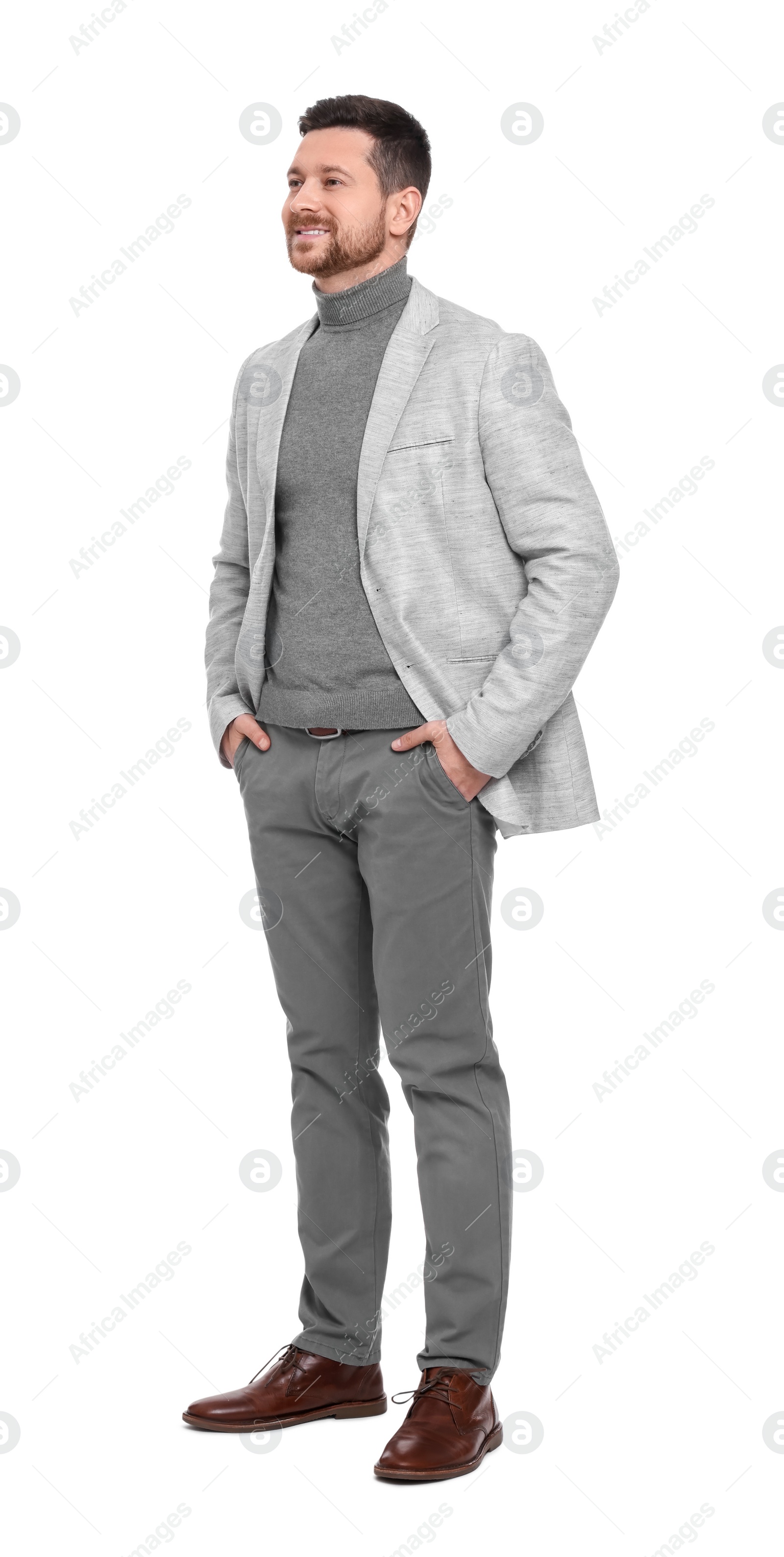 Photo of Handsome bearded businessman in suit on white background