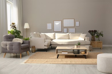 Photo of Beautiful living room interior with comfortable sofa