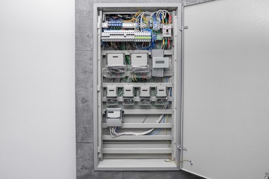 Fuse box with many electric meters and wires