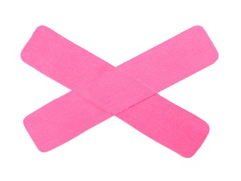 Photo of Pink kinesio tape pieces on white background, top view