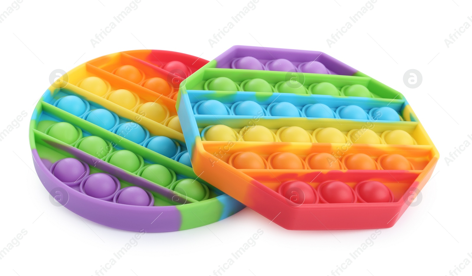 Photo of Rainbow pop it fidget toys on white background