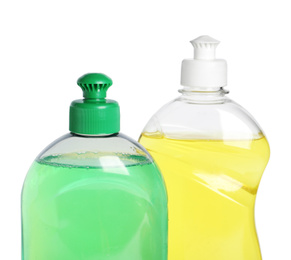 Photo of Bottles with different detergents on white background