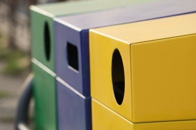 Garbage containers for waste sorting outdoors, closeup