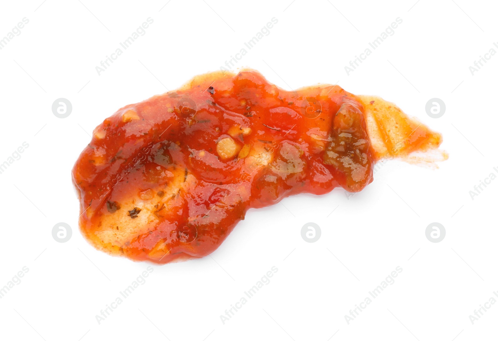 Photo of Smear of delicious adjika sauce isolated on white, top view