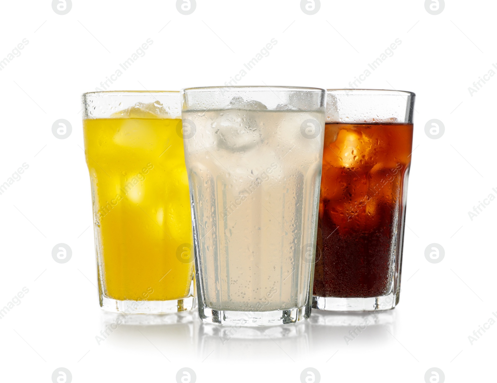 Photo of Delicious refreshing drinks in glasses on white background