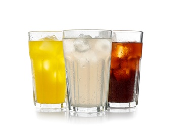 Photo of Delicious refreshing drinks in glasses on white background