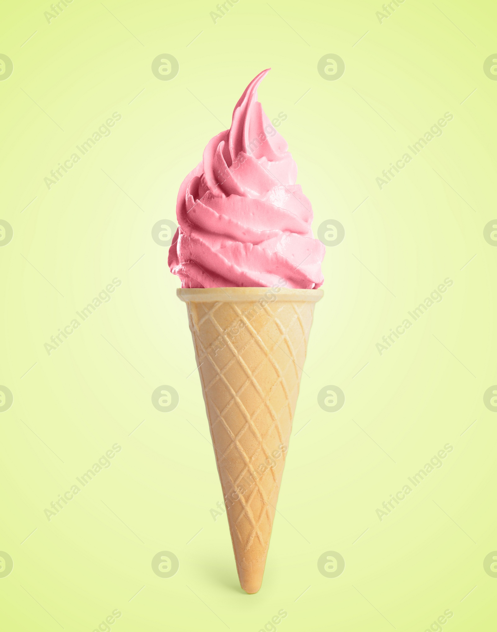 Image of Delicious soft serve berry ice cream in crispy cone on pastel green yellow background