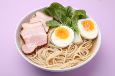 Photo of Delicious ramen with meat on violet background, closeup. Noodle soup