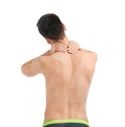 Young man suffering from neck pain on white background