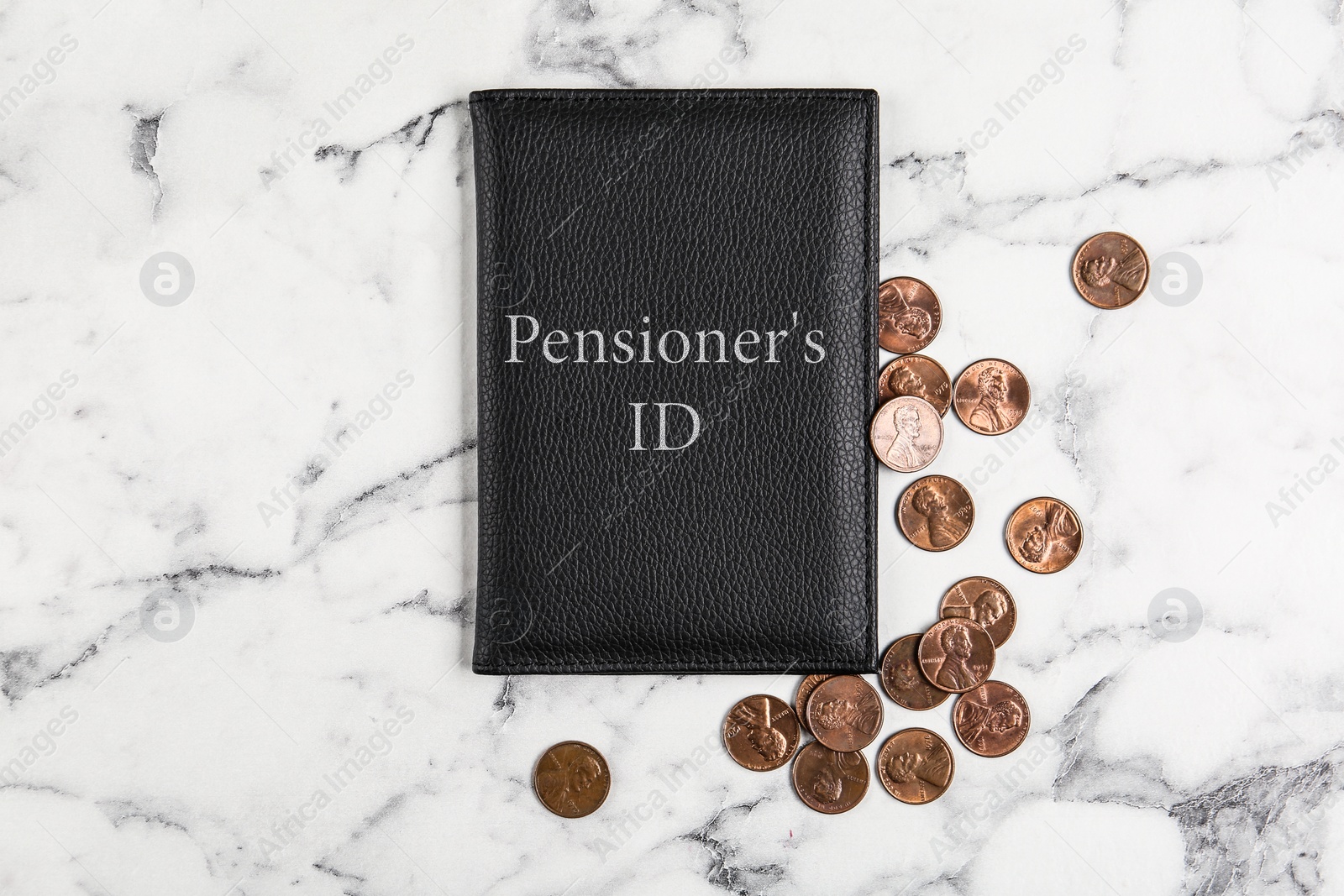 Photo of Pension certificate with American coins on marble table, flat lay