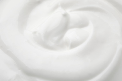Photo of Delicious creamy yogurt as background, closeup view