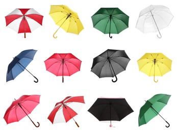 Image of Set with different stylish umbrellas on white background 