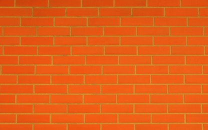 Texture of orange red color brick wall as background