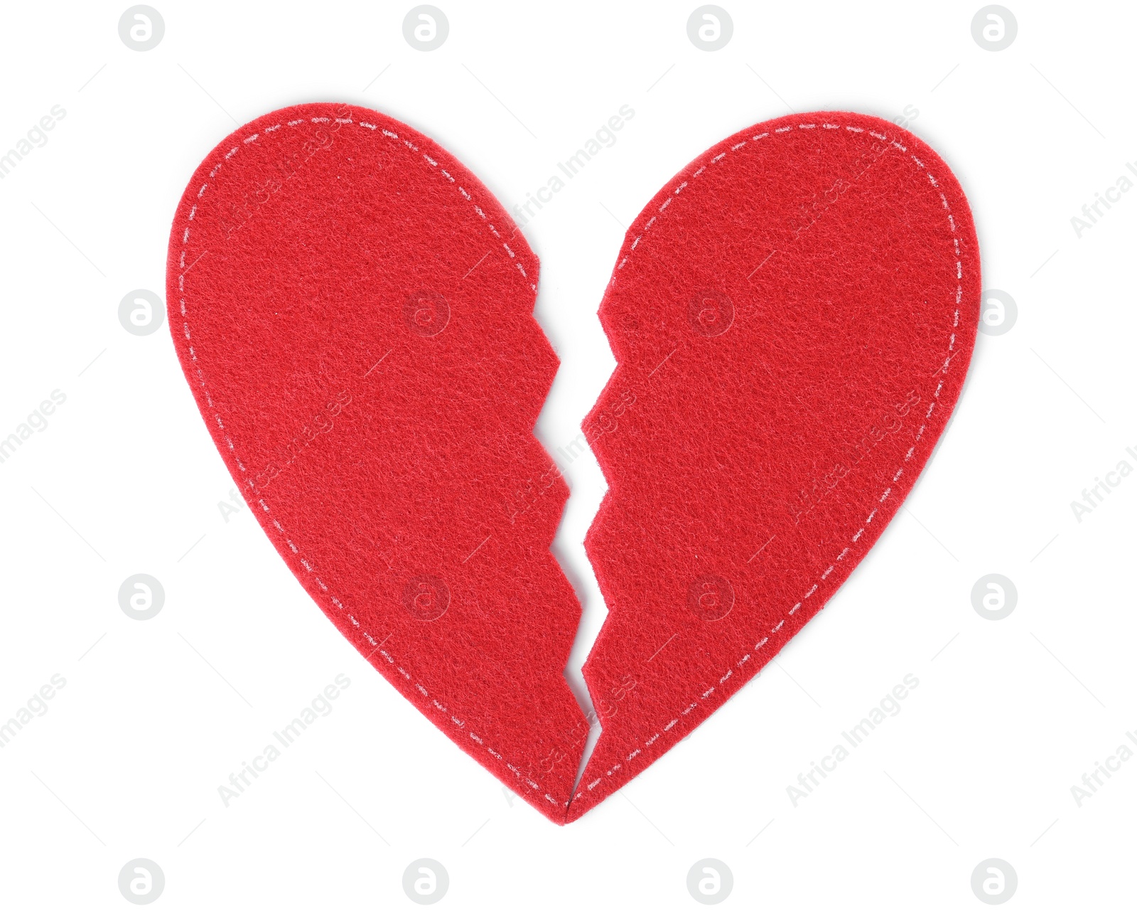 Photo of Halves of red felt heart on white background, top view