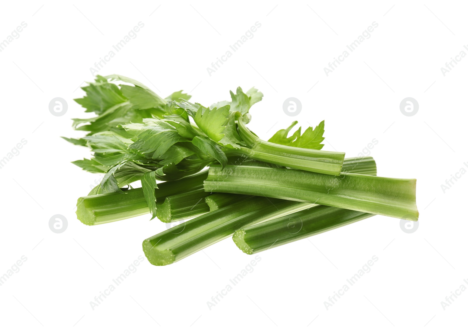 Photo of Fresh green celery sticks and leaves isolated on white