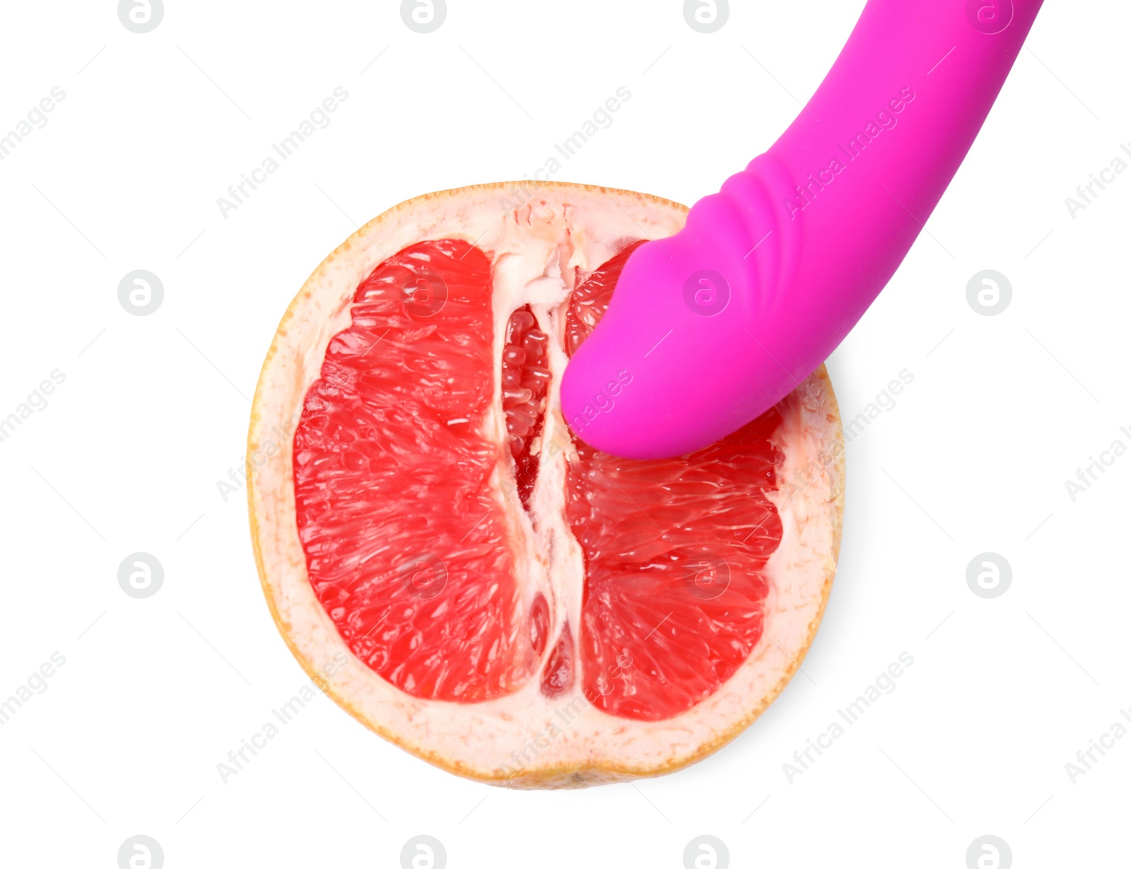 Photo of Half of grapefruit and purple vibrator on white background, top view. Sex concept