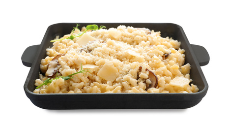 Delicious risotto with cheese and mushrooms isolated on white