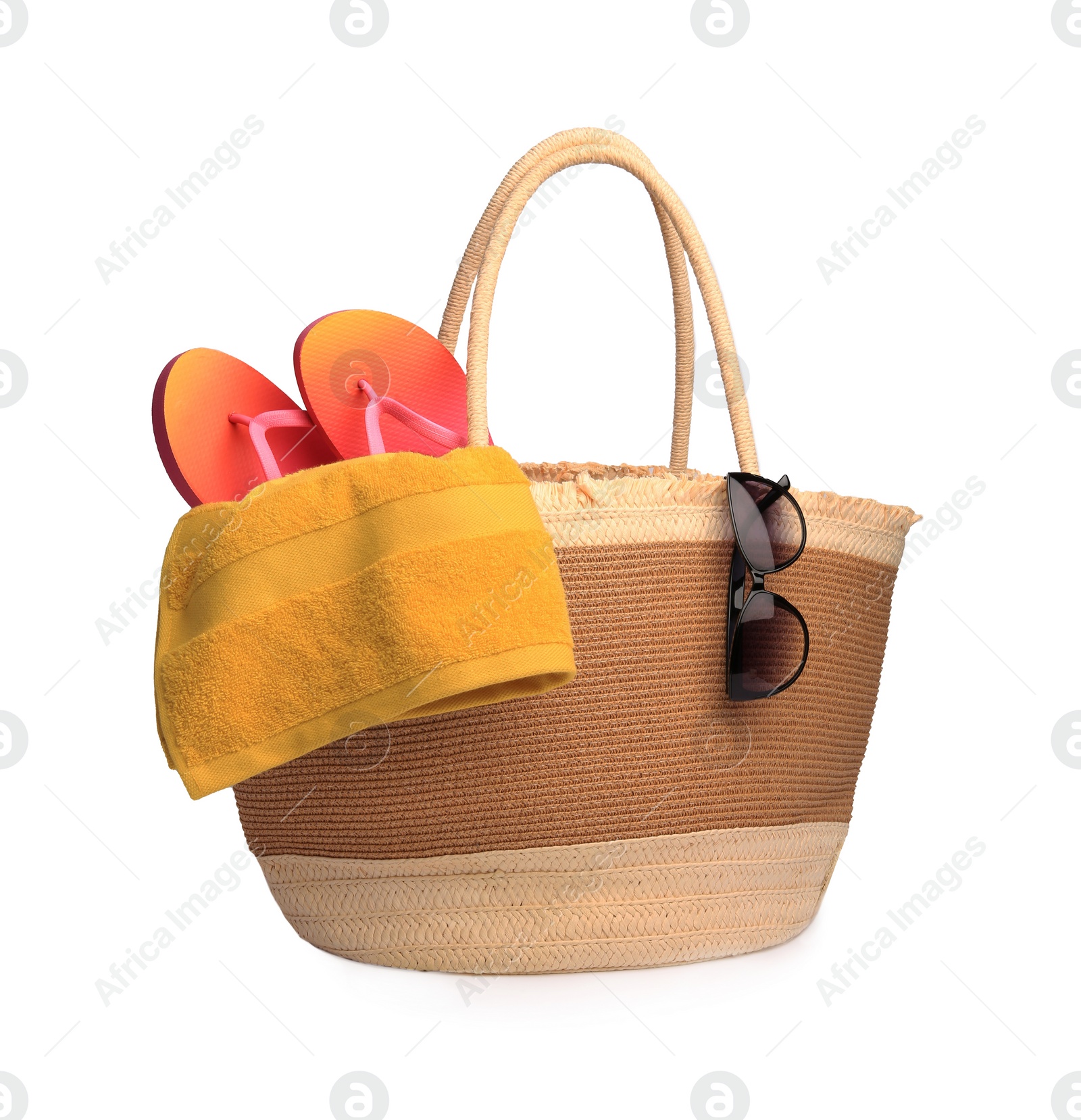 Photo of Stylish straw bag with beach objects isolated on white