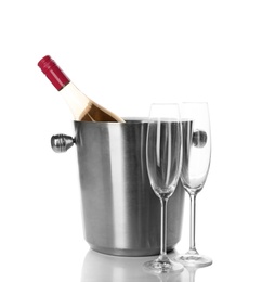 Photo of Bottle of rose champagne in bucket and glasses on white background