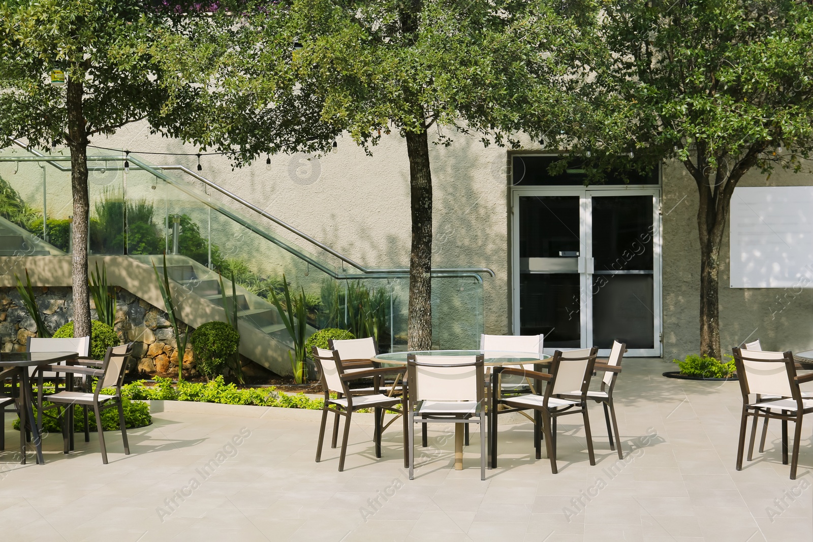 Photo of Outdoor chairs and tables at luxury resort