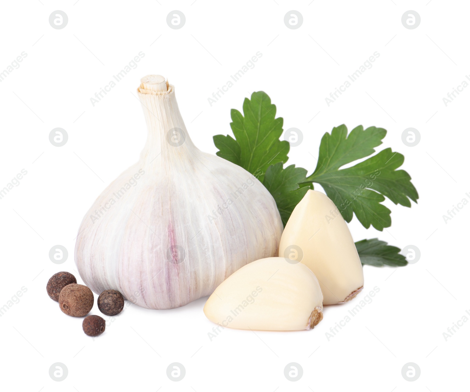 Photo of Fresh garlic bulb and cloves with seasonings isolated on white. Organic food