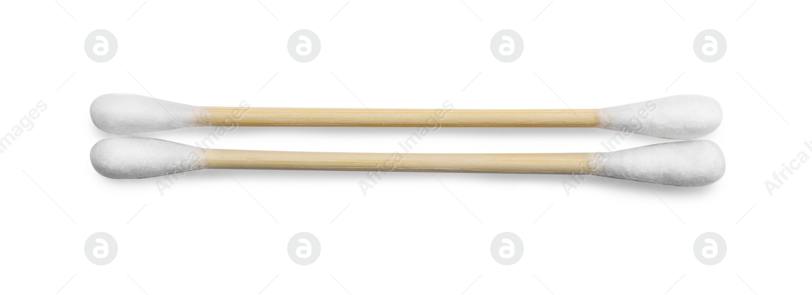 Photo of Wooden cotton buds on white background, top view