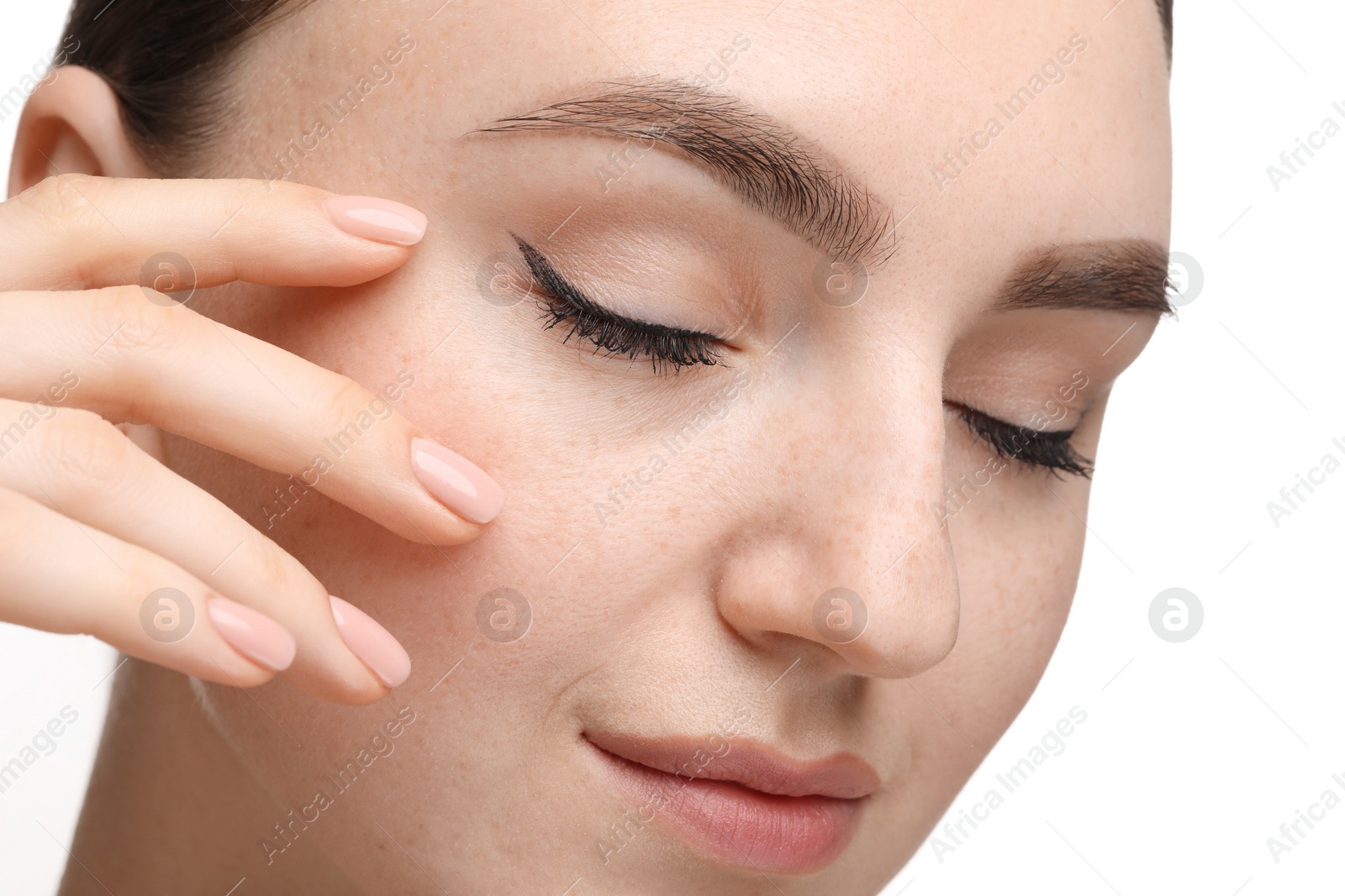 Photo of Makeup product. Woman with black eyeliner and beautiful eyebrows on white background, closeup