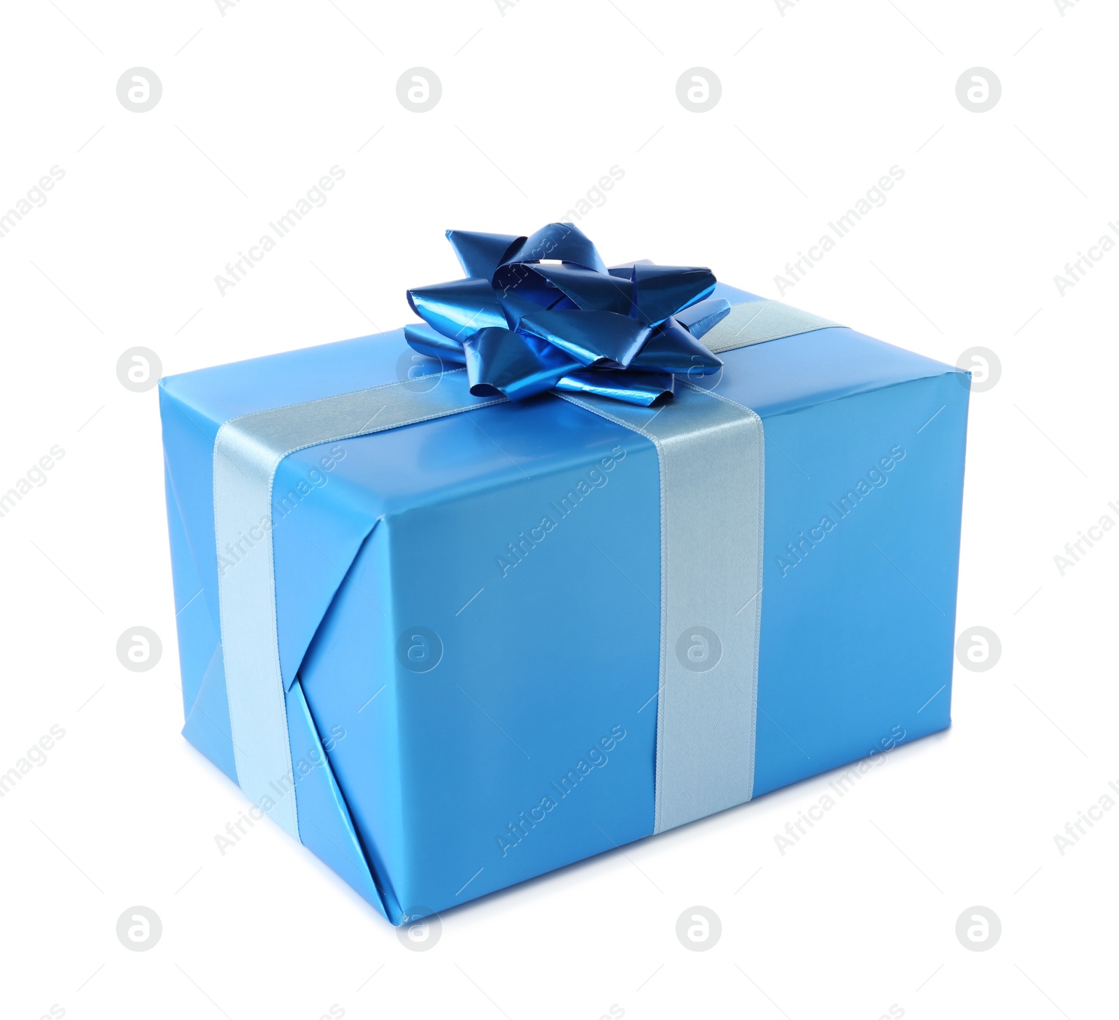 Photo of Beautifully wrapped gift box with blue bow isolated on white