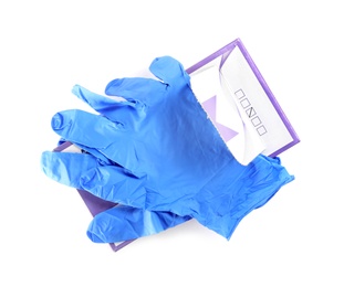 Photo of Box of new medical gloves isolated on white, top view