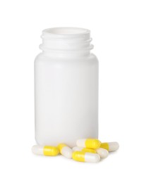 Photo of Antibiotic pills and bottle isolated on white