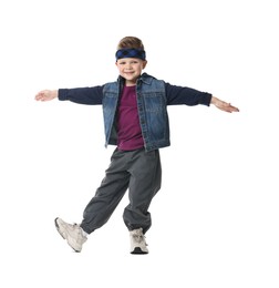 Photo of Happy little boy dancing on white background