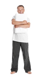 Man holding soft pillow on white background