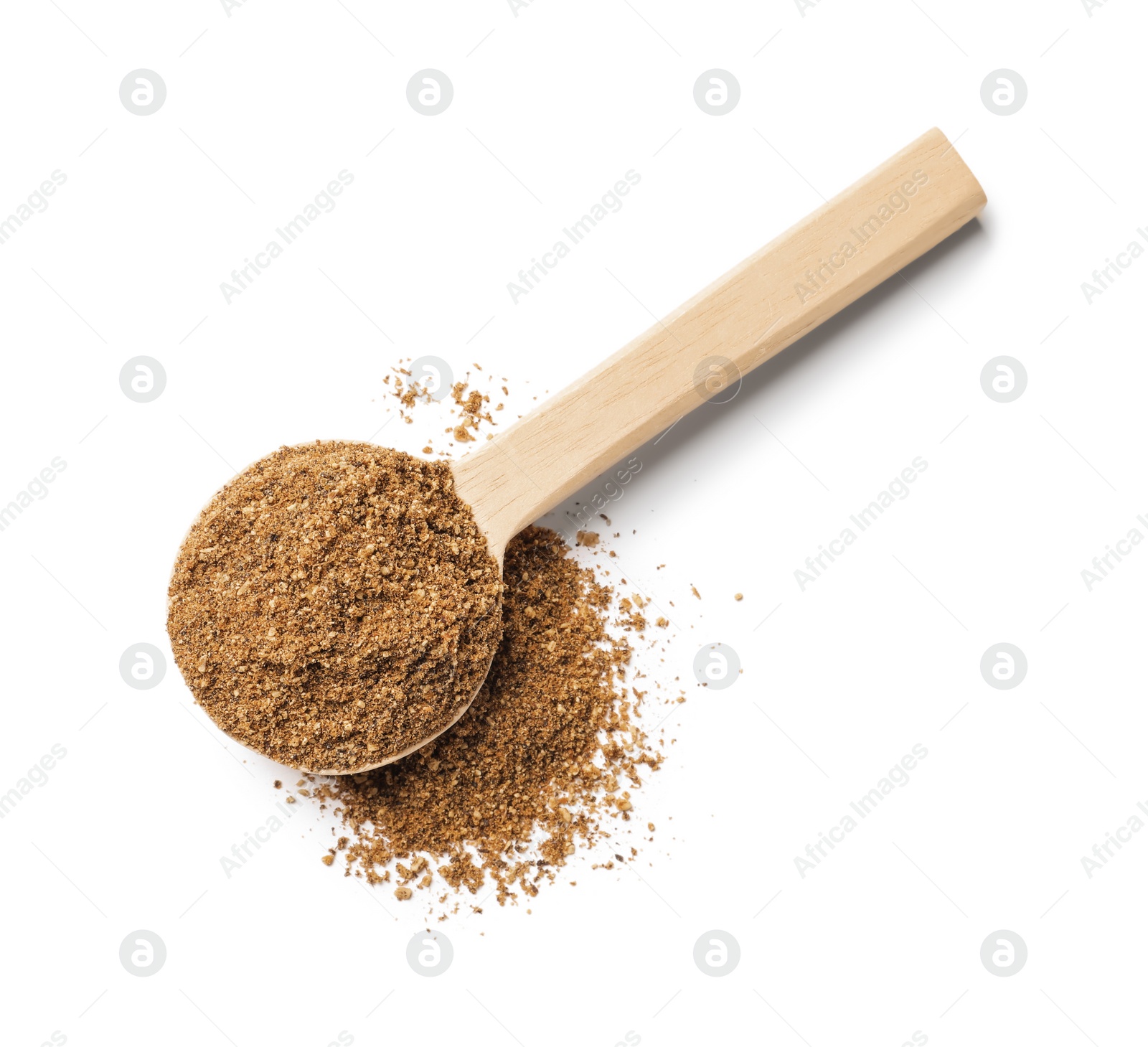 Photo of Wooden spoon of aromatic caraway (Persian cumin) powder isolated on white, top view