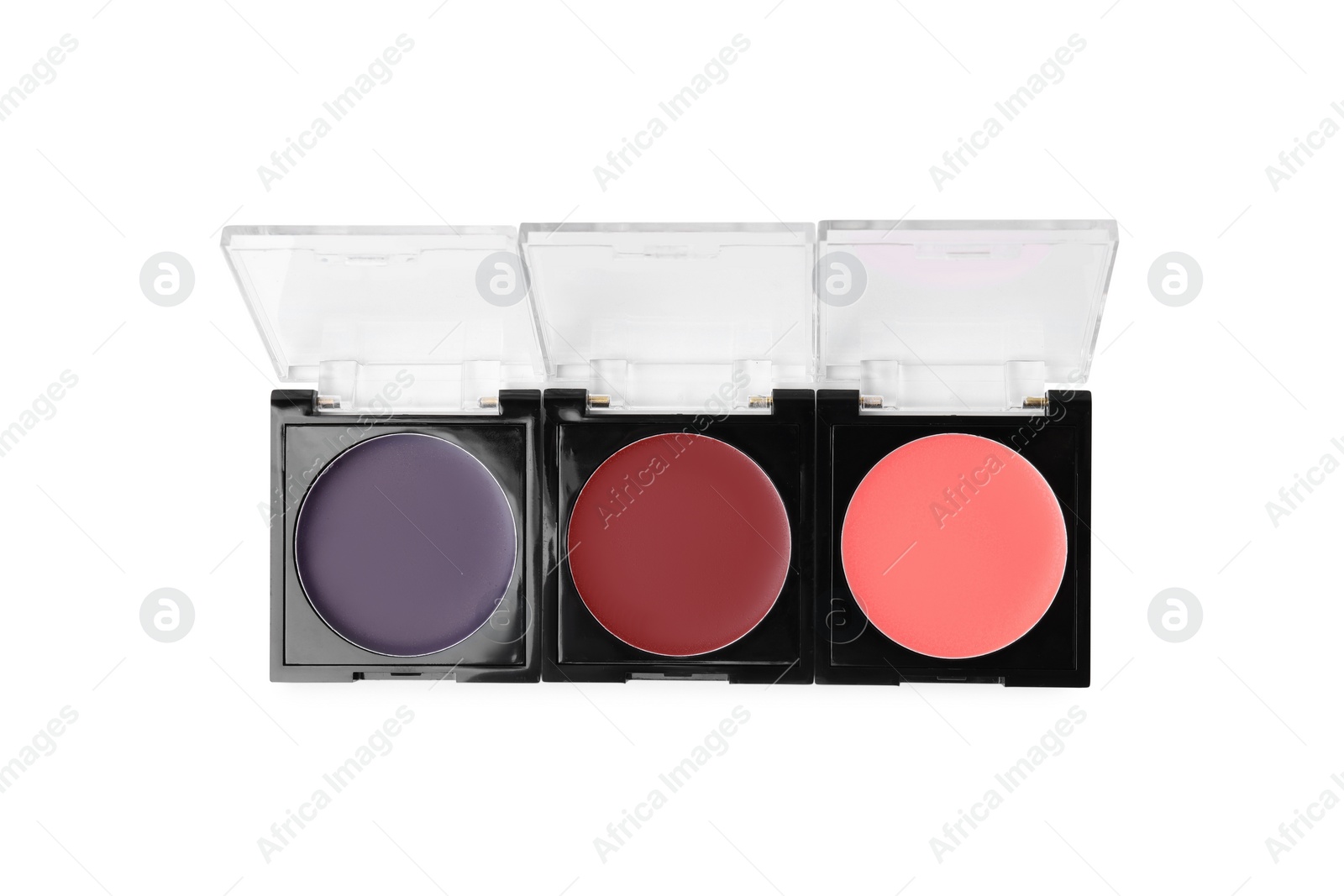 Photo of Cream lipstick palettes refills isolated on white, top view. Professional cosmetic product