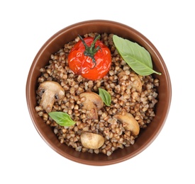 Delicious buckwheat porridge with mushrooms and tomato on white background, top view