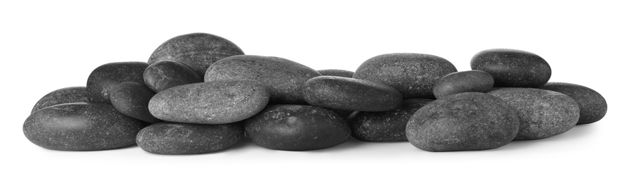 Pile of spa stones on white background