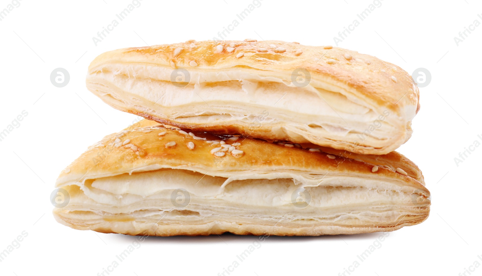 Photo of Delicious fresh puff pastries isolated on white