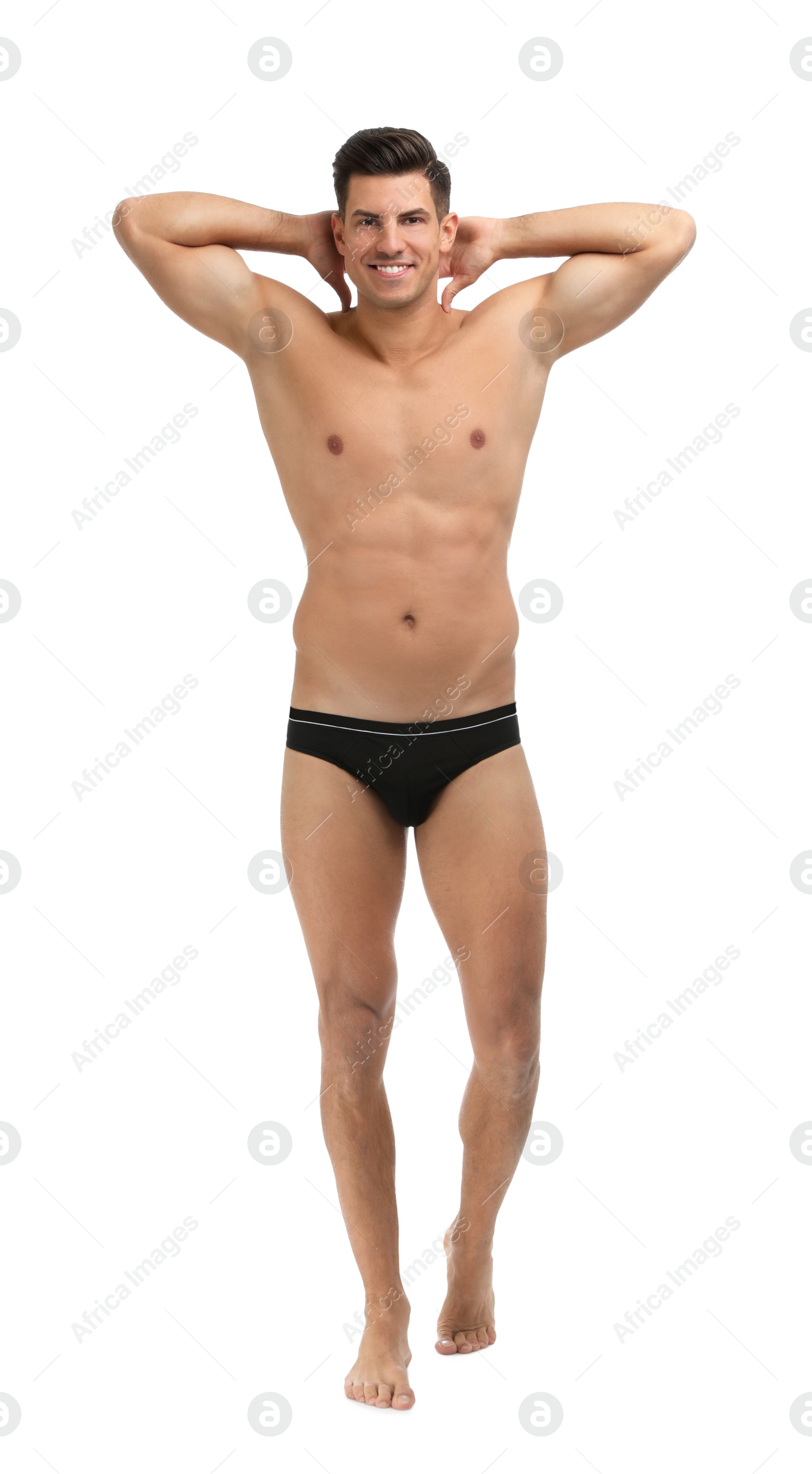 Photo of Handsome man in black underwear on white background