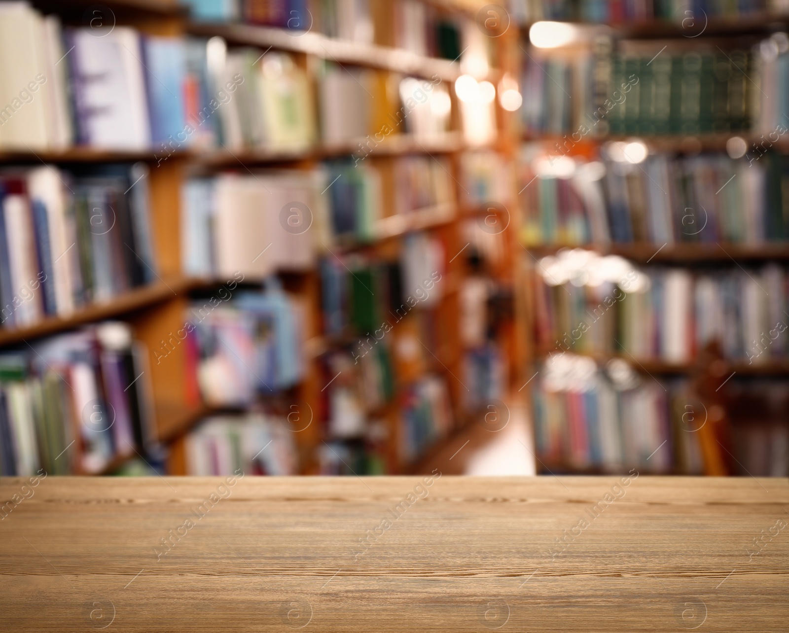 Image of Empty wooden table in library. Space for design 