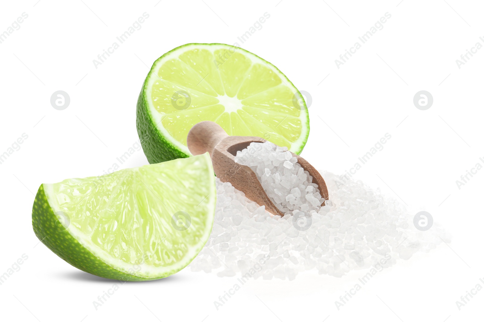 Image of Cut lime and salt isolated on white. Margarita cocktail ingredients