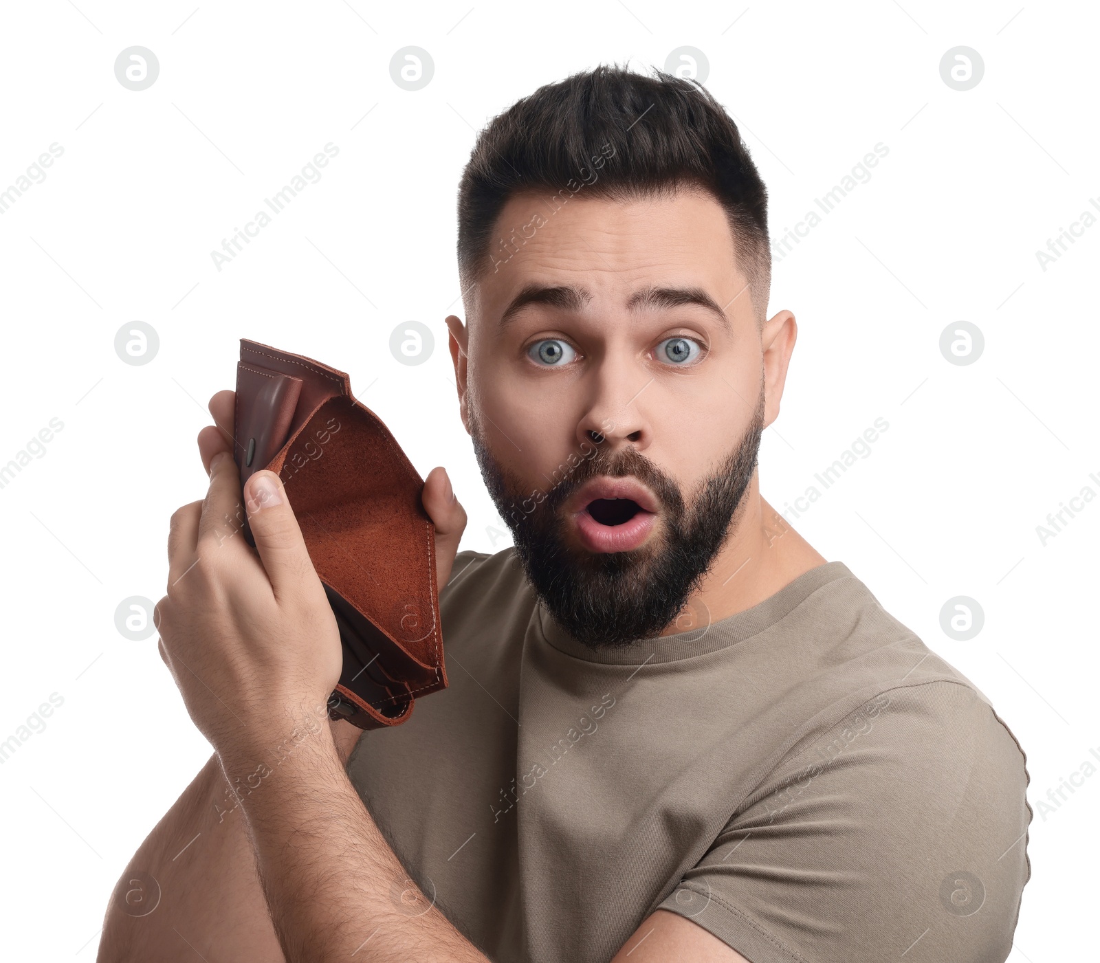 Photo of Confused man showing empty wallet on white background